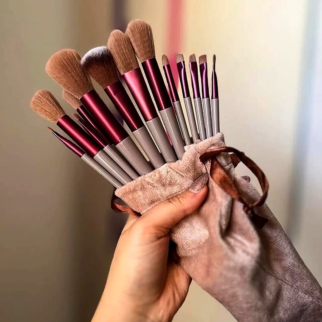 MK Signature Wine Edit 13-piece makeup brush set with wine-coloured handles